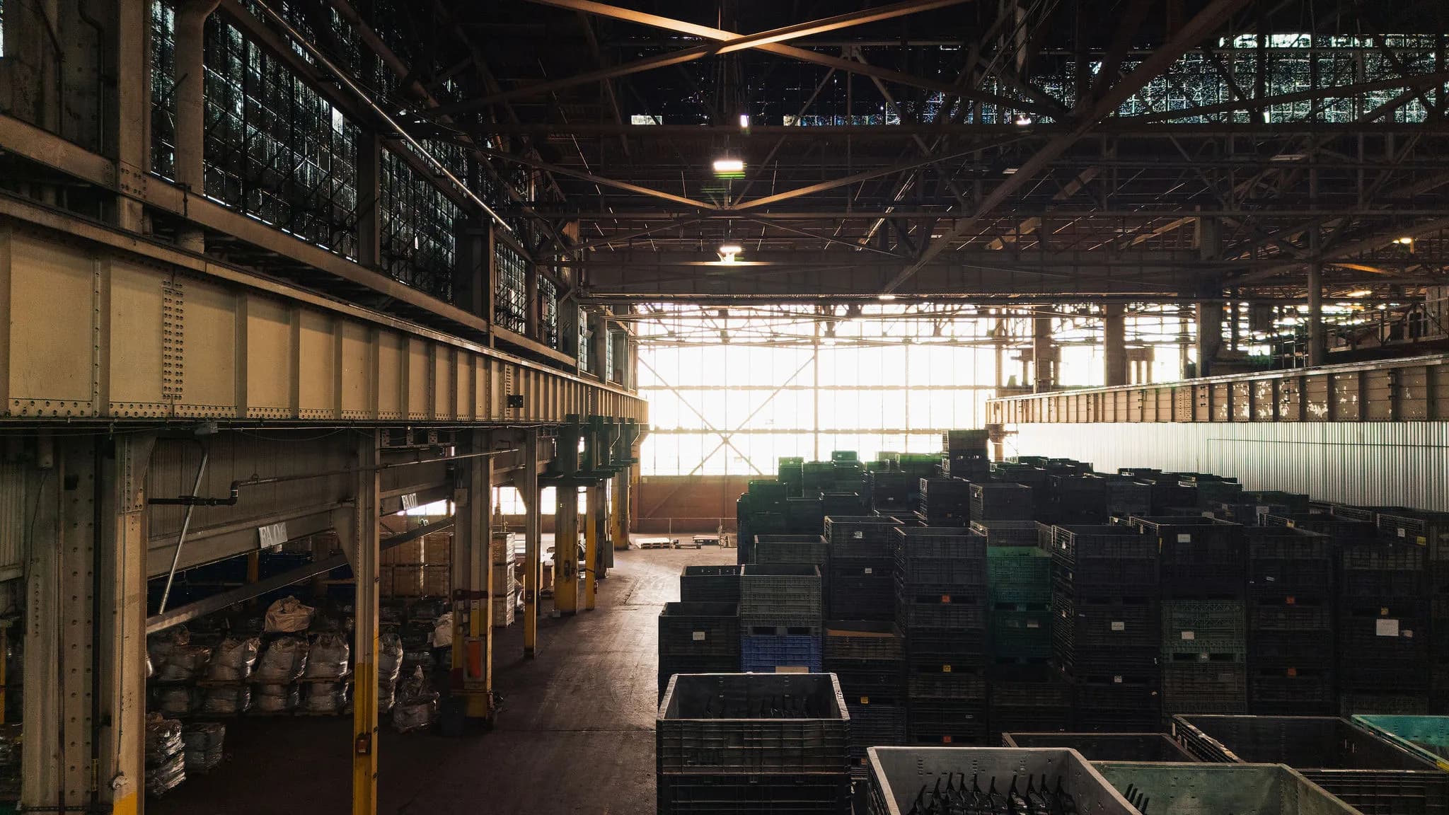 Large warehouse interior with overhead crane rails