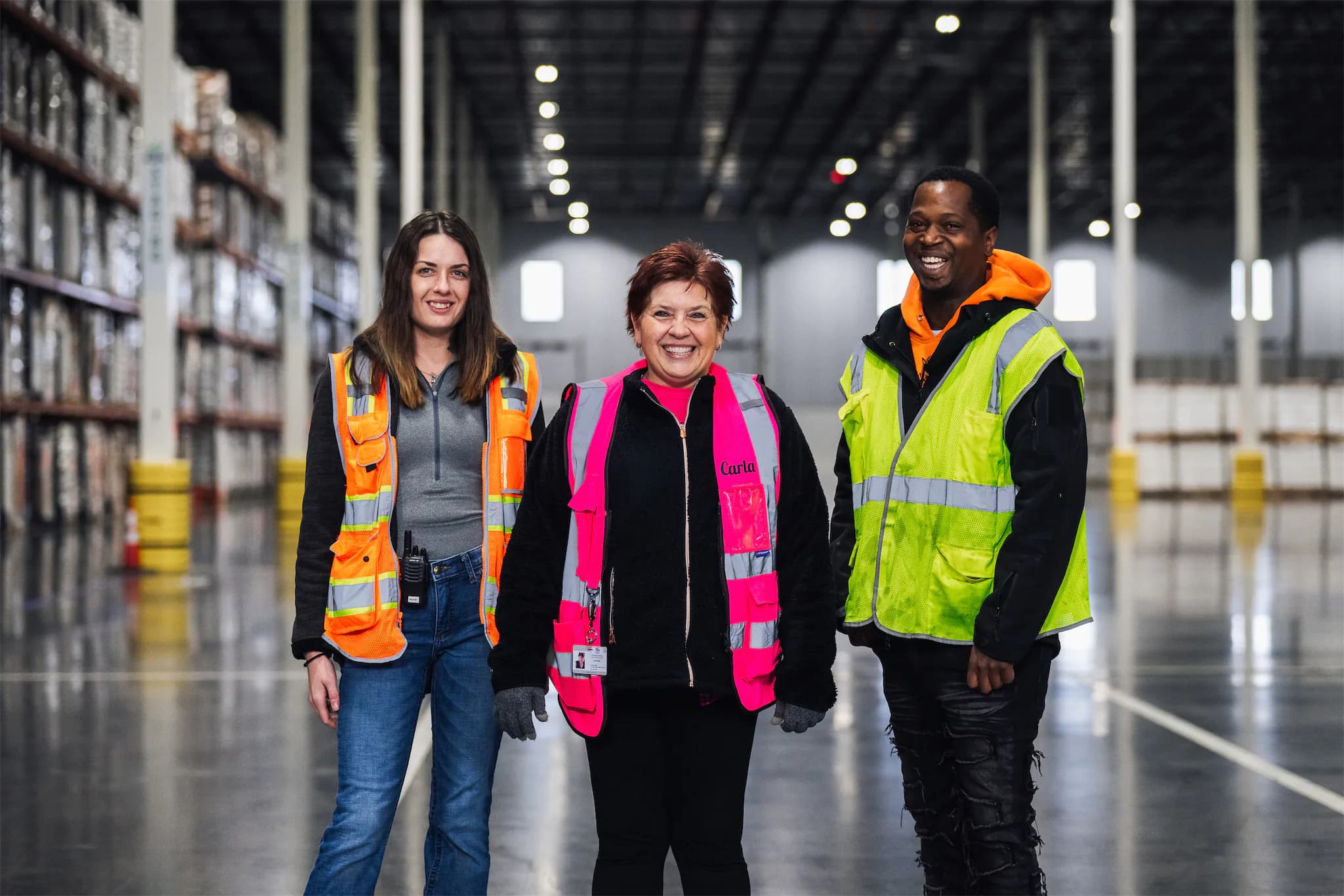 Three Commonwealth employees in a group portrait